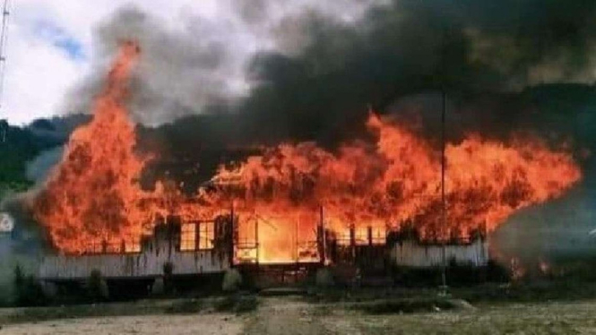 Ilustrasi pembakaran di Paniai, Papua, oleh KKB