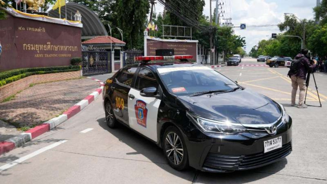 Mobil polisi Thailand saat berada di sebuah tempat kejadian perkara