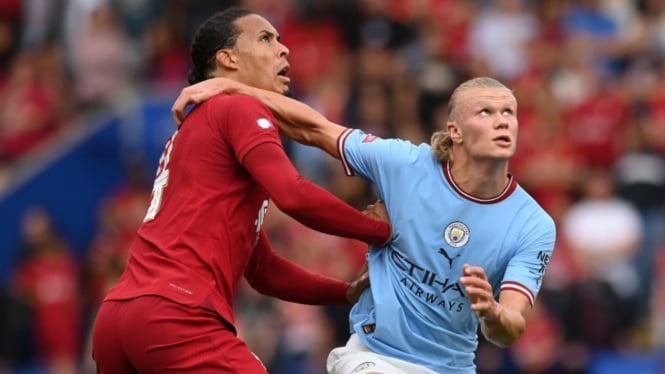 Virgil van Dijk dan Erling Haaland.                                   