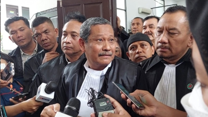 Erman Umar, pengacara Bripka Ricky Rizal, terdakwa kasus pembunuhan Brigadir J