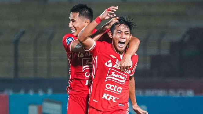 Selebrasi Persija Jakarta saat mencetak gol