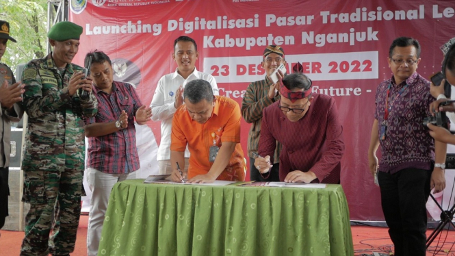 Kemendag menggandeng Pos Indonesia meresmikan digitalisasi pasar rakyat