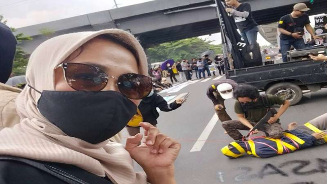 Ernawati, istri polisi yang buat tagar #percumalaporpolisi
