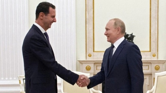Presiden Rusia Vladimir Putin, bertemu dengan Presiden Suriah, Bashar al-Assad.