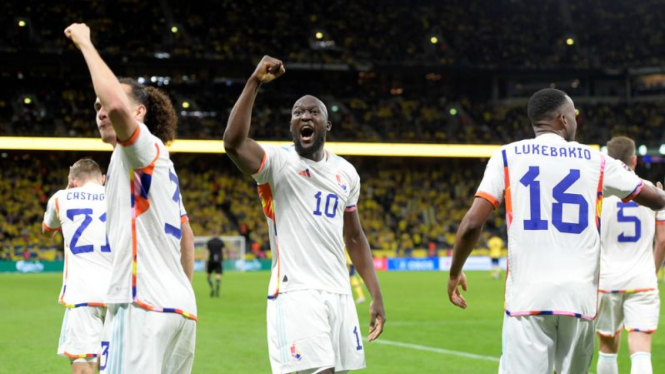 Striker Timnas Belgia, Romelu Lukaku merayakan gol.