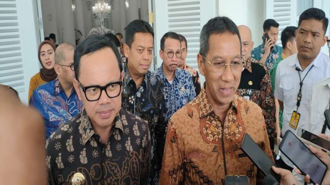 Wali Kota Bogor Bima Arya dan Pj Gubernur DKI Jakarta Heru Budi Hartono