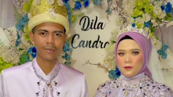 Tangkapan layar video resepsi pernikahan Candra dan Dila.