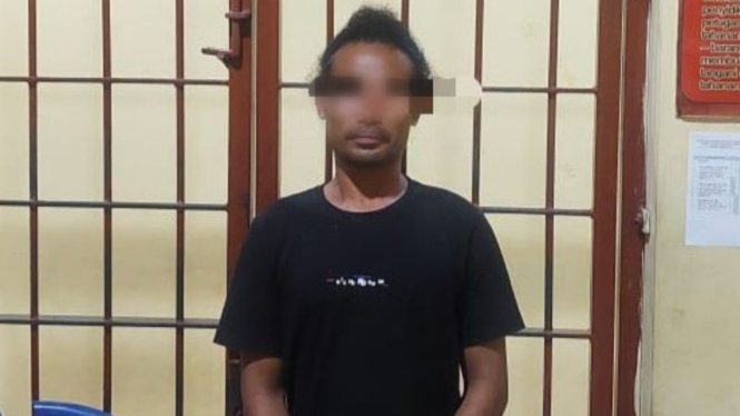 Pelaku AR (29) usai ditangkap polisi