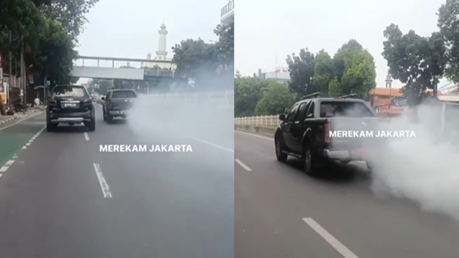 Mobil Pelat Merah Pemprov DKI Jakarta Keluarkan Asap tebal