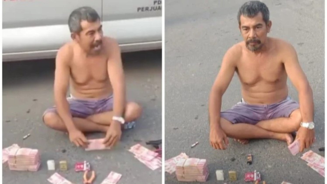 Viral Aksi Pria di Tapteng Pamer Uang Ratusan Juta di Tengah Jalan.