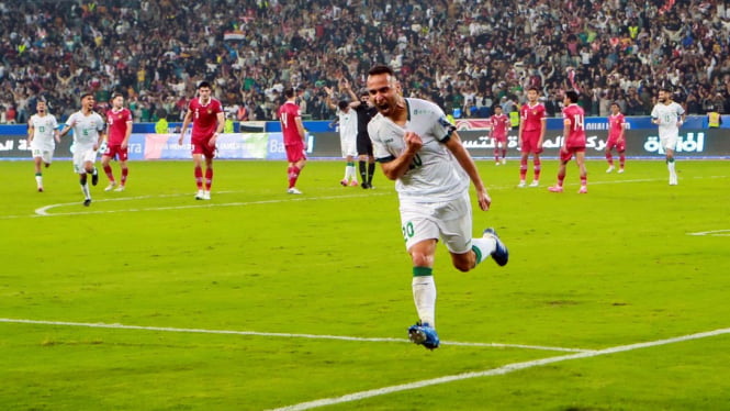 Pemain Timnas Irak Osama Rashid rayakan gol ke gawang Timnas Indonesia
