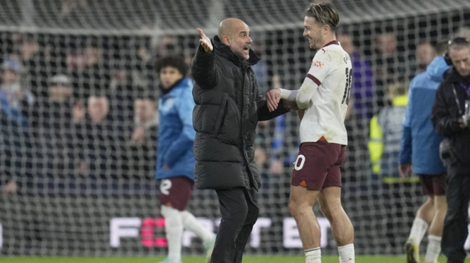 Pep Guardiola dan Jack Grealish