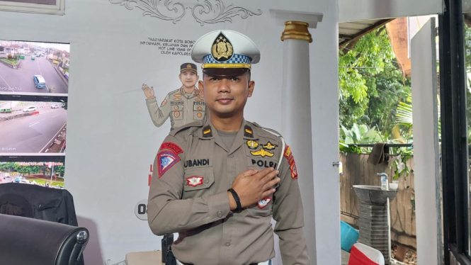 Anggota Polisi Lalu Lintas Polresta Bogor Kota Ipda Subandi 