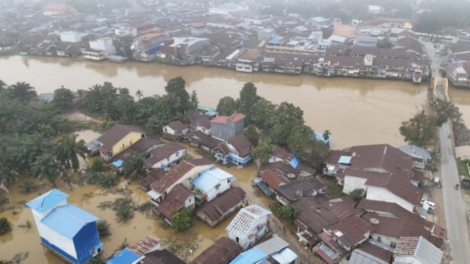 Banjir yang melanda di Kabupaten Landak, Kalimantan Barat, beberapa hari lalu. 