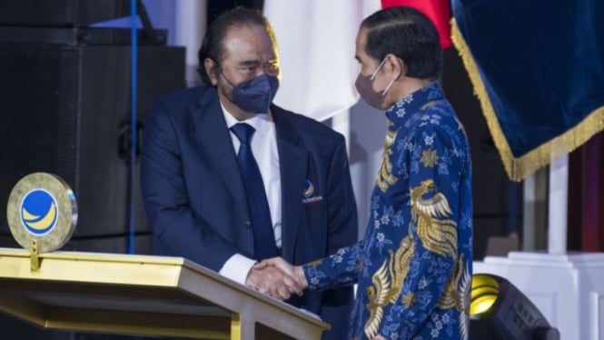 Ketua Umum Partai Nasdem Surya Paloh dan Presiden Jokowi