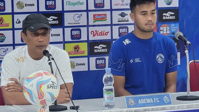 Pelatih Arema FC, Widodo Cahyono Putro dan M Rafli.