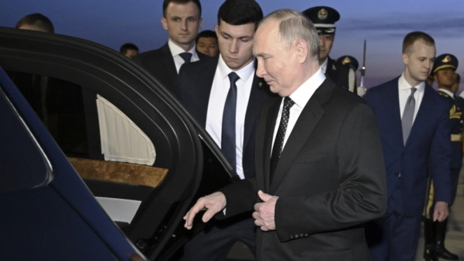 Presiden Putin Tiba di China (Doc: AP Photo/Yue Yuewei)