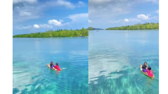 Momen 2 Anak Perempuan Terekam Mendayung Perahu Kecil di Pulau Bacan 
