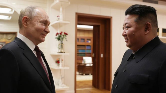 Momen Putin Bersama Kim Jong Un (Doc: TASS)