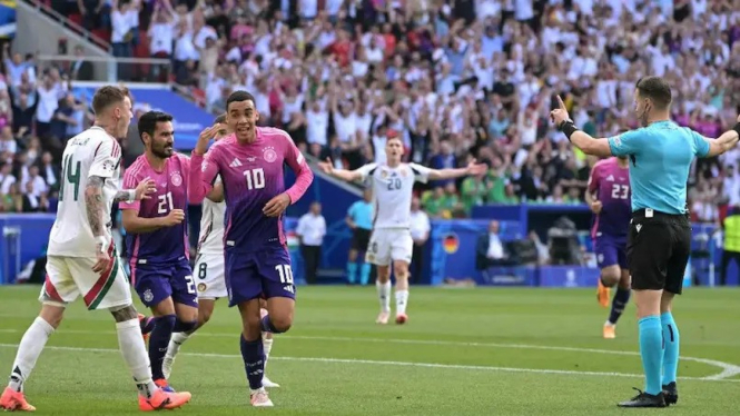 Jamal Musiala merayakan gol Jerman ke gawang Hungaria