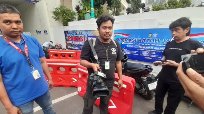 Jurnalis Kompas TV Laporan
