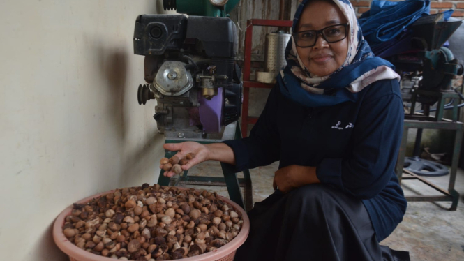 Suhartini, Ketua Kelompok Wanita Tani Melati di Desa Sukarya, Musi Rawas