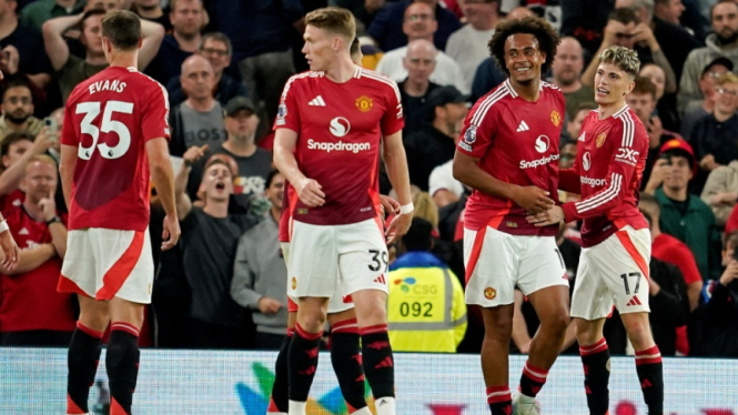 Manchester United merayakan gol ke gawang Fulham