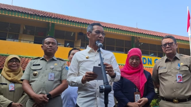 Penjabat (Pj) Gubernur Jakarta, Heru Budi Hartono Tinjau Makan Bergizi Gratis di SDN Gunung 01, Jakarta Selatan