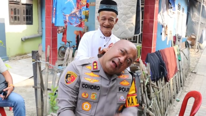 Momen Kapolres Serang di Urut Kakek-kakek.