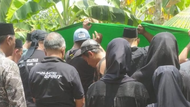 Prosesi pemakaman ASA di TPU Ngijo, Karangploso, Kabupaten Malang. 