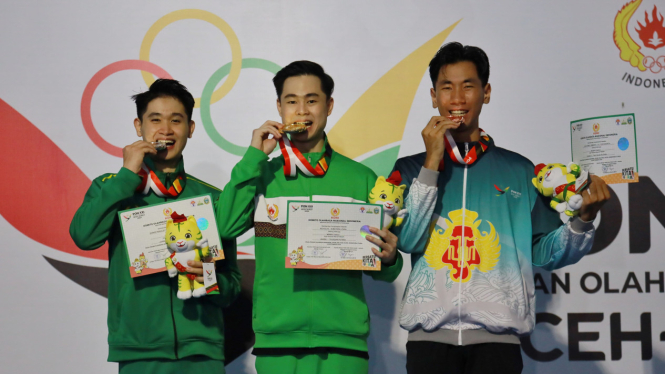 Harris Horatius, Atlet Wushu Sumut sukses raih medali emas di PON 2024.(dok PON 2024 wilayah Sumut)