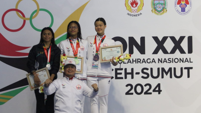 Adelia Chantika (13 tahun) emas 200 M punggung