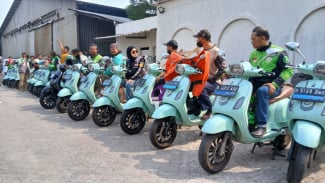 Cara Smoot Bantu Ojol Lewat Motor Listrik