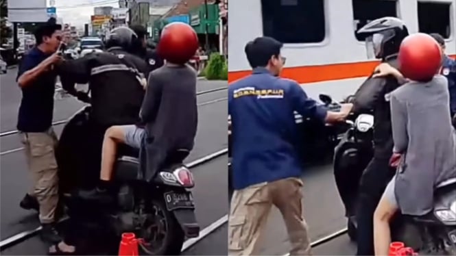 Detik-detik pemotor nekat melewati palang kereta dan ribut dengan petugas