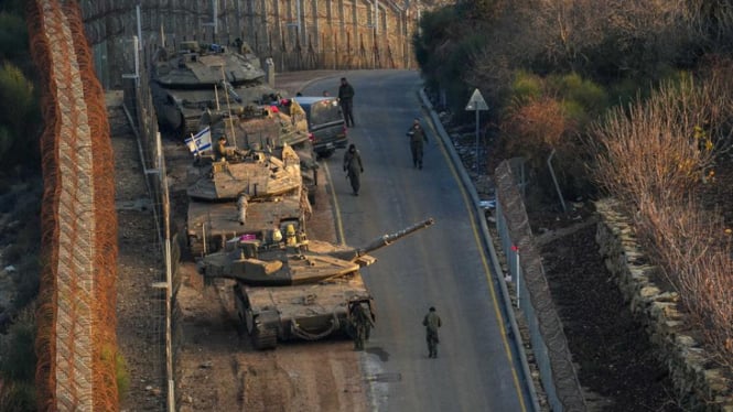 VIVA Militer: Tank Merkava Mark IV militer Israel di perbatasan Suriah