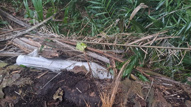 Jasad AS ditemukan dalam karung di kebun sawit, di Kabupaten Sergai.(dok Polres Sergai)