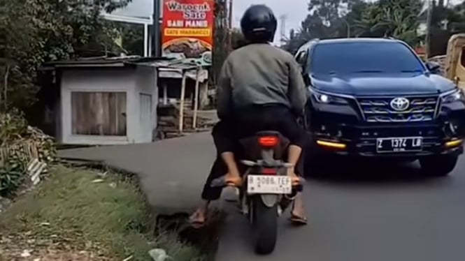 Viral Fortuner Pelat Sipil Pakai Strobo Dikawal Polisi dan Hampir Mencelakai Pemotor