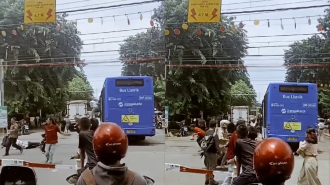 Viral Detik-detik Bus TransJakarta Terjebak di Tengah Rel, Penumpang Panik