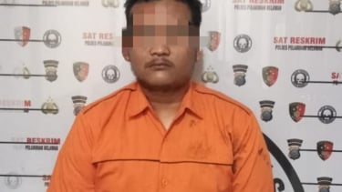 Driver Taksi Online, R saat diamankan petugas kepolisian.(dok Polres Pelabuhan Belawan)