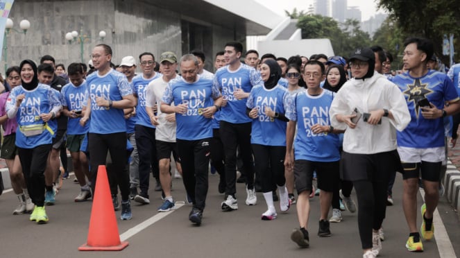 Ketum Pan Zolkilif Hasan Shin corre con Tae Yong y varios números