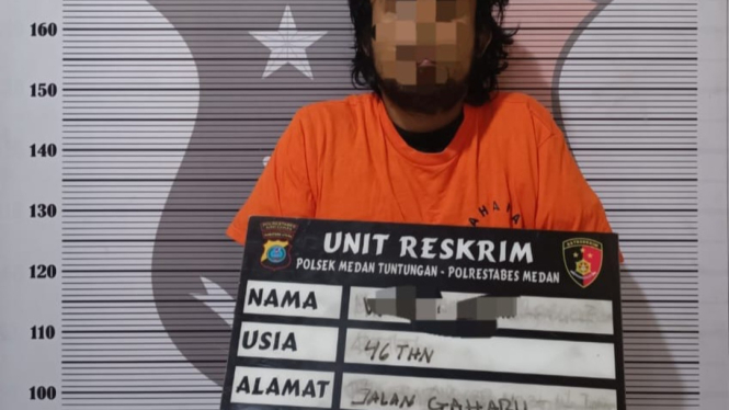 Pelaku WA saat diamankan petugas kepolisian.(dok Polsek Medan Tuntungan)