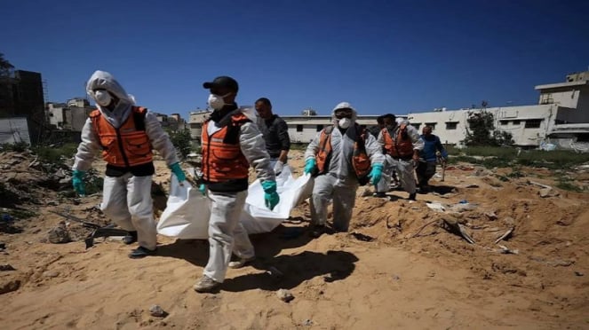 Grupo de búsqueda para evacuar los cuerpos palestinos en las ruinas del Hospital Al-Seils Gaza