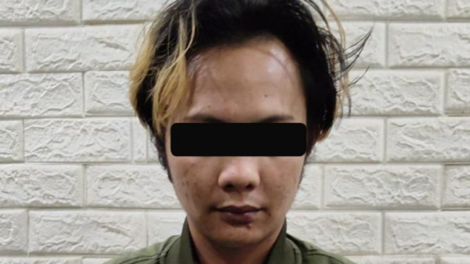 Pelaku yang menodong penjaga warung Madura di Cempaka Putih.