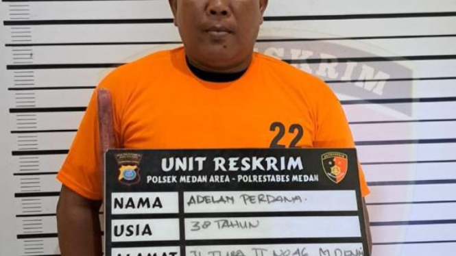 Pelaku Adelan Perdana saat diamankan petugas kepolisian.(istimewa/VIVA)
