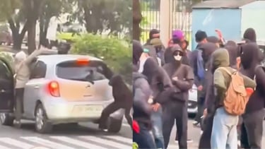 ¡Triste! Una madre es atacada por un grupo de jóvenes en una agitación de los trabajadores: un automóvil está dañado