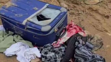 Koper berisikan jasad wanita