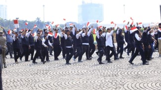 Polri Libatkan Satpam hingga Masyarakat dalam Devile Hari Bhayangkara ke-79 di Monas