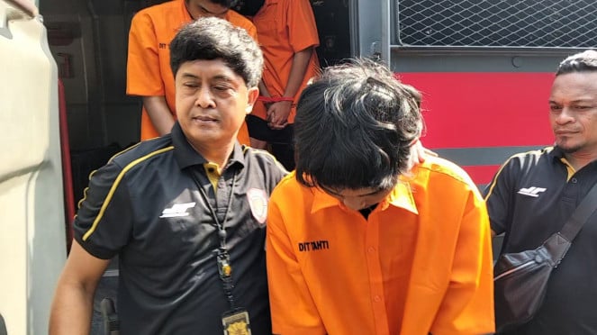 Tersangka pembunuhan wanita diborgol di Cisauk
