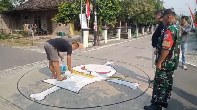 Pemuda Sragen Didatangi Aparat usai Gambar One Piece di Jalan, Diminta Hapus