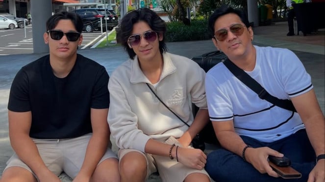 Andrei Taulani y sus dos hijos.